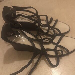 Chic Black Strappy Women's Sandals
Chanel, size 40
New Without Box